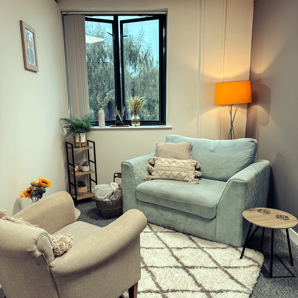 Counselling space in Lincoln with sofa, table and chair